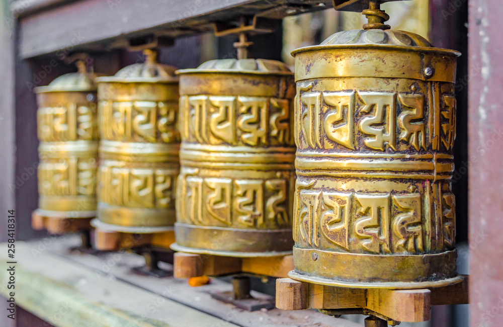 Brass Buddhist prayer wheels, Kathmandu, Nepal. Brass Buddhist prayer wheels, Kathmandu, Nepal.