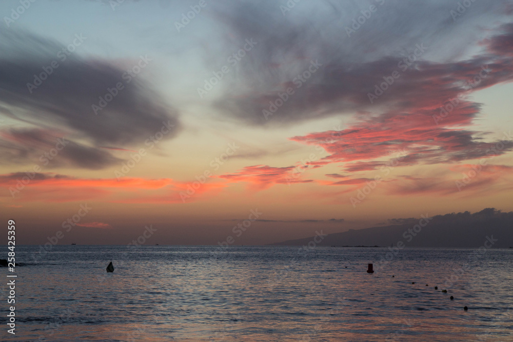 beautiful sunset over the Atlantic ocean at Costa Adaje, Tenerife Island, Spain