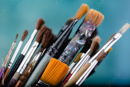 Close up of different paint brushes