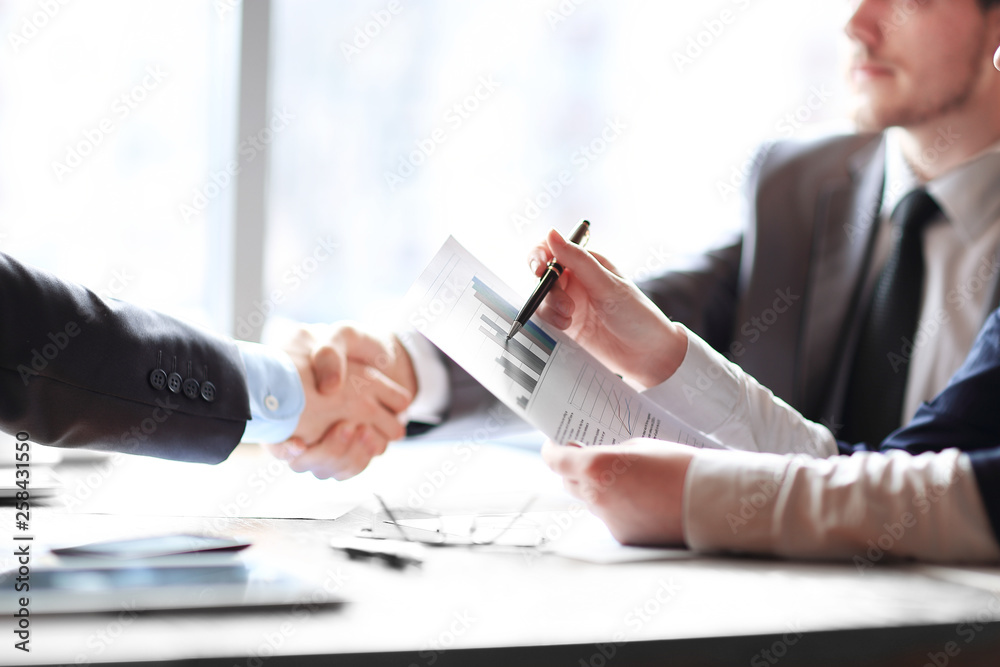 close up.business handshake business people at the Desk .business concept