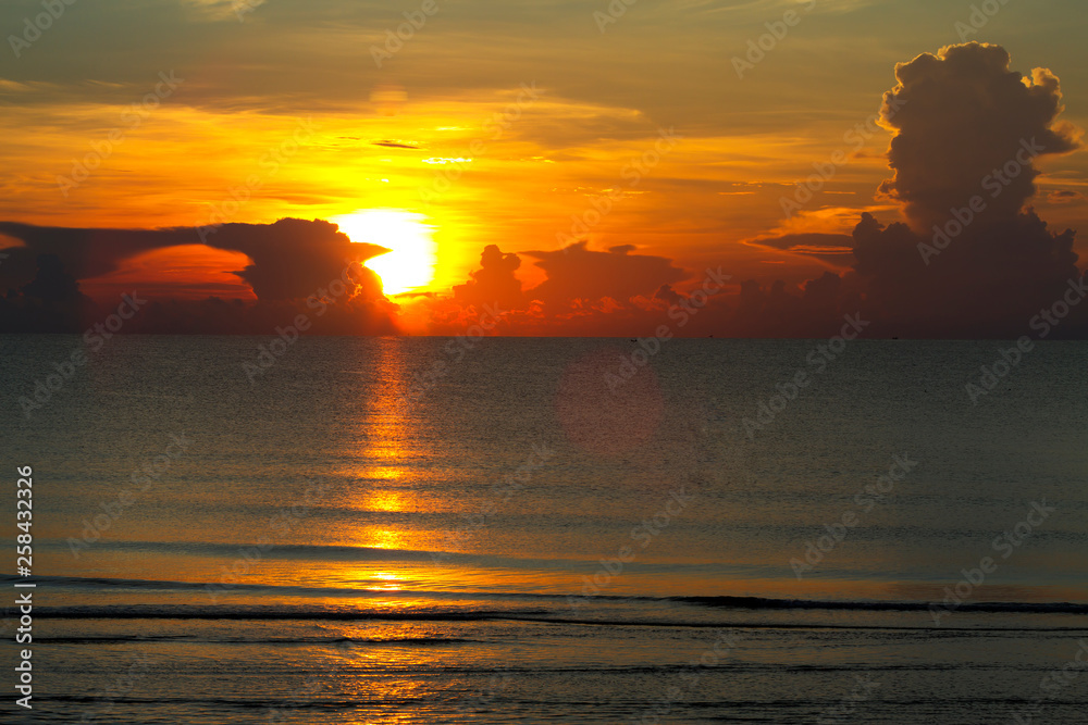 Sunrise with silhouette on baech at beach Ban Krut