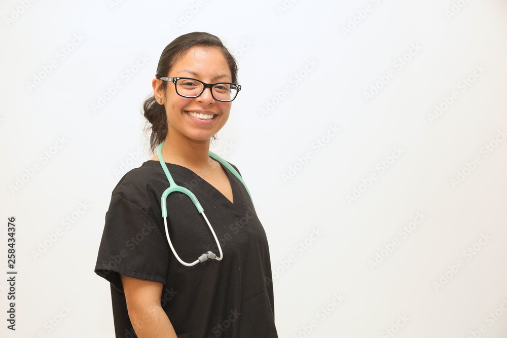 Multi ethnic female healthcare professional, white background with copy space Multi ethnic female healthcare professional, white background with copy space