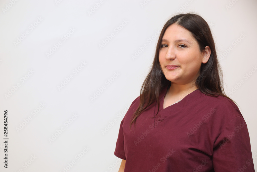 Female healthcare professional on white background with copy space. Female healthcare professional on white background with copy space.