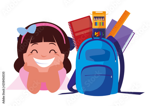 happy little schoolgirl with schoolbag and supplies
