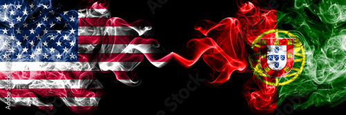 United States of America vs Portugal, Portuguese smoky mystic flags placed side by side. Thick colored silky smoke flags of America and Portugal, Portuguese