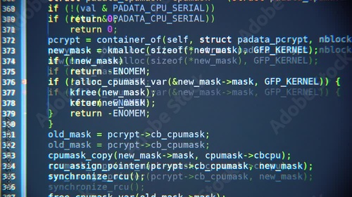 The program code scrolls on the computer screen