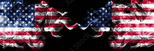 United States of America vs United States of America, American smoky mystic flags placed side by side. Thick colored silky smoke flags of America and United States of America, American