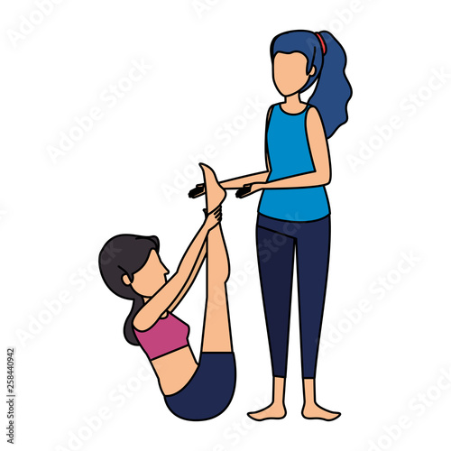 group of women practicing yoga position