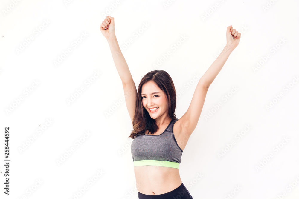 Sport woman in sportswear relax stand after workout on white background.Diet concept.Fitness and healthy lifestyle