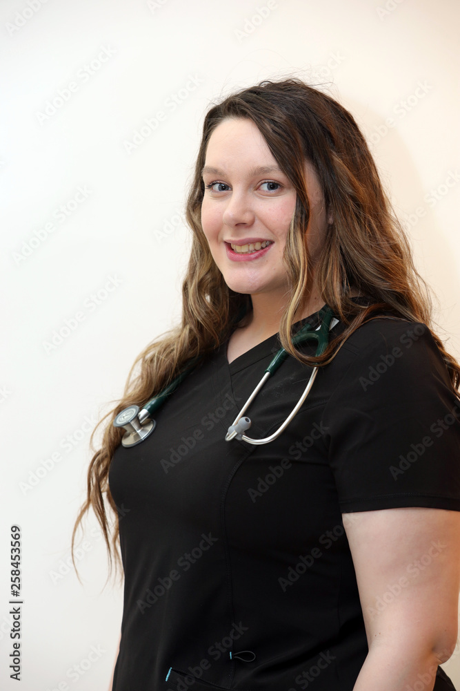 female healthcare professional, nurse on white backgrounds with copy space female healthcare professional, nurse on white backgrounds with copy space