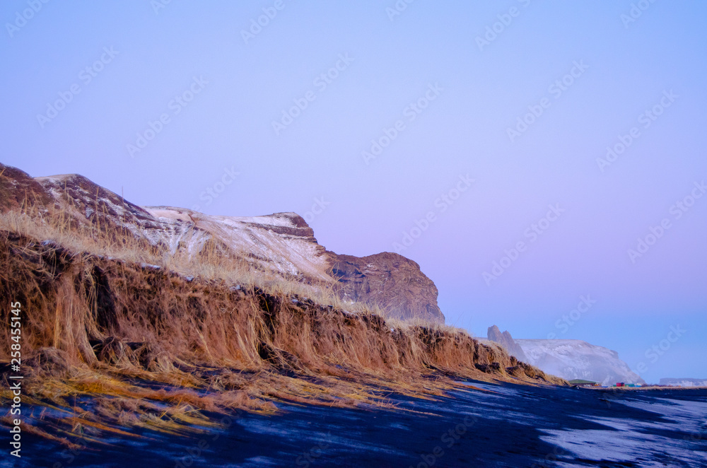 Vik Beaches in Iceland, with cliffs and mountains in view