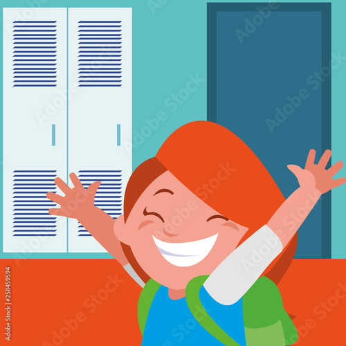 little schoolgirl with schoolbag in school corridor