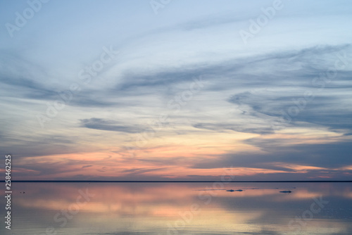 Salt lake. Evening sunset with beautiful sky and water.