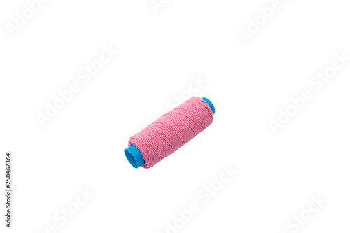 Thread bobbin isolated on a white background