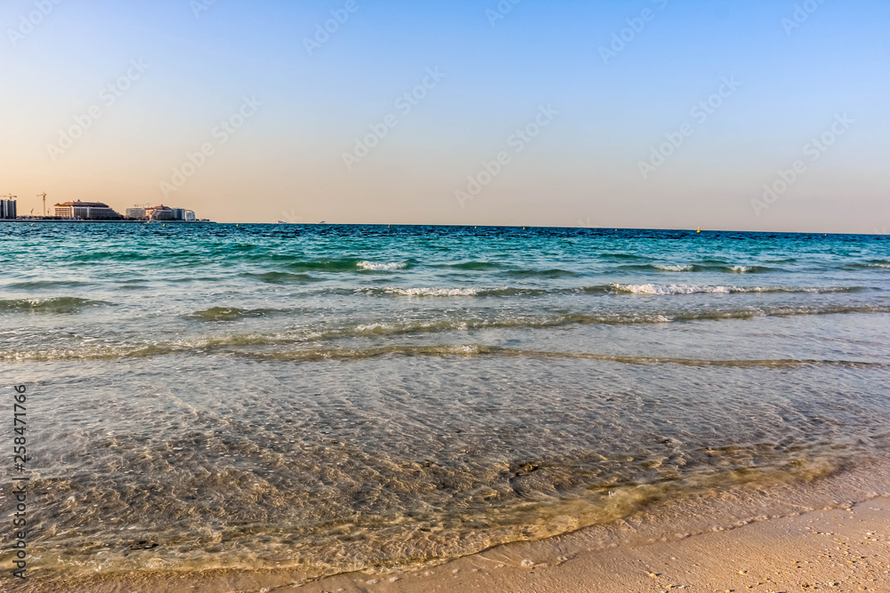 Horizon of Seascape, water waves at Jumeirah Beach in Dubai, United Arab Emirates