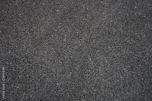 Small varies shape of black gravel stone texture wall floor for wallpaper, background or decoration printables.