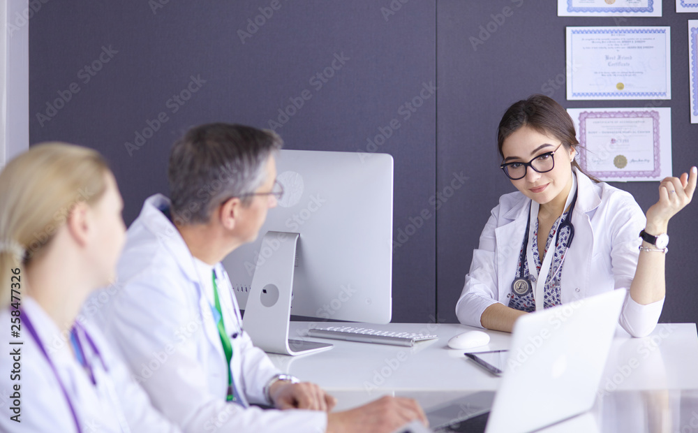 Doctors having a medical discussion in a meeting room Doctors having a medical discussion in a meeting room