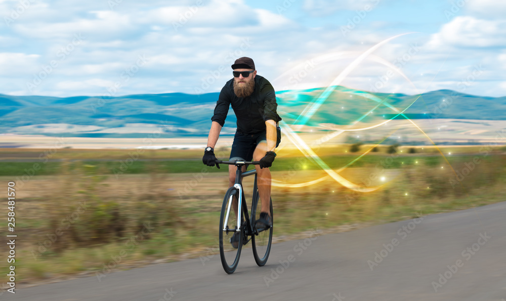 Young cyclist riding bicycle with magical landscape and concept Young cyclist riding bicycle with magical landscape and concept