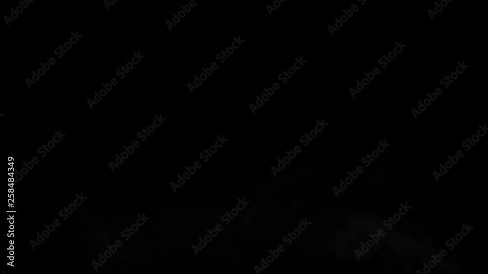 Dynamic smoke motion on a dark black background for video design Dynamic smoke motion on a dark black background for video design
