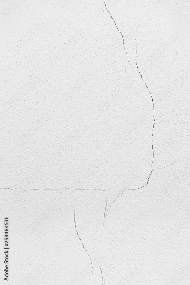 Obraz premium White cracks cement texture background.