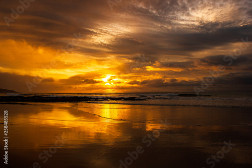once in a life time beautiful sunrise over the indian ocean, waves are breaking at the great ocean road, victoria, australia