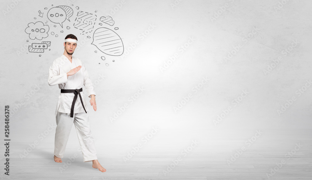 Young kung-fu trainer fighting with doodled symbols concept
Young kung-fu trainer fighting with doodled symbols concept