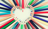 colored pencils lying around the heart