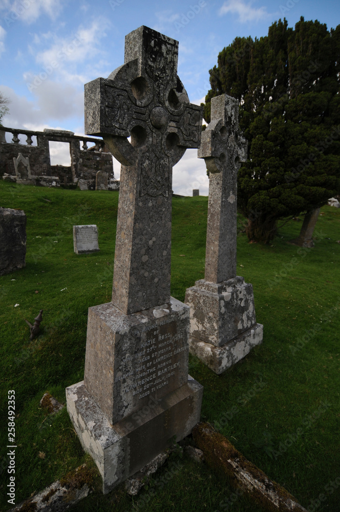Two celtic crosses of the cemetery of the Cill Chriosd Church on the Isle of Skye