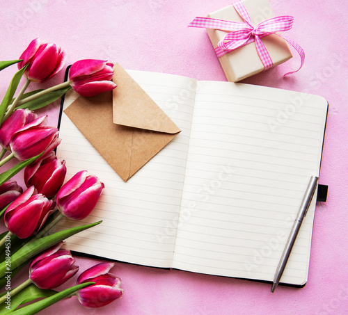 Notebook, gift box and pink tulips © Olena Rudo