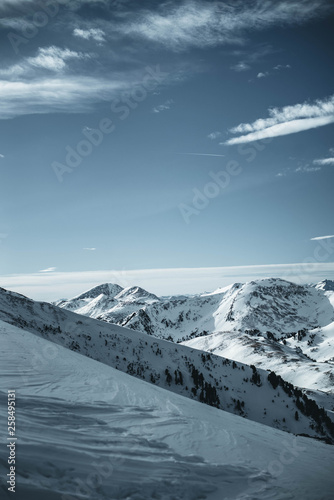 Nocky mountains in Alps photographed from a slope in February. Winter wonderland in Austria. photo