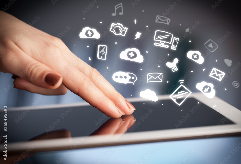 Hand holding tablet with social media concept
Hand holding tablet with social media concept
