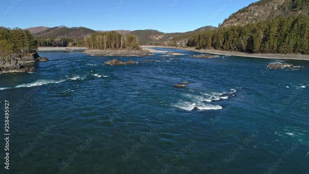 Low flight over fresh cold mountain river. Altai, Katun river. 4k (UHD) aerial view. Low flight over fresh cold mountain river. Altai, Katun river. 4k (UHD) aerial view.
