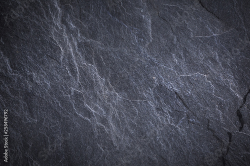 Dark grey and black slate background or texture