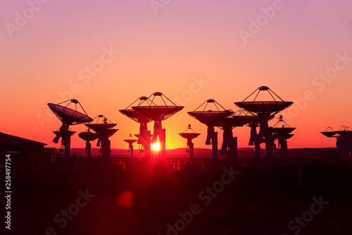 Observatory equipment, silhouette at sunrise © hanmaomin