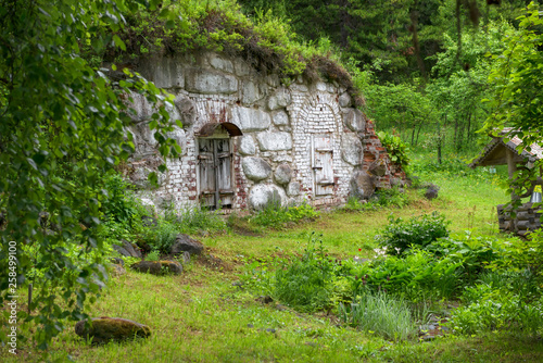 SOLOVKI, REPUBLIC OF KARELIA, RUSSIA - JUNE 27, 2018:  Old cellar in the Botanical garden on Solovki. Solovki Islands, Arkhangelsk region, White Sea