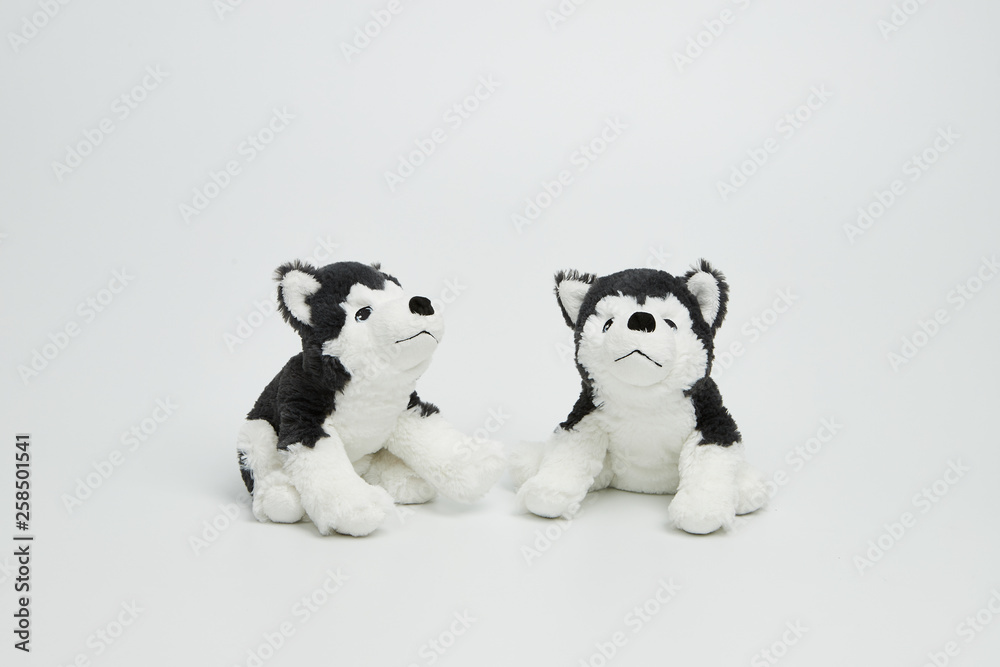 Cute dog doll isolated on white background. (with free space for text) 