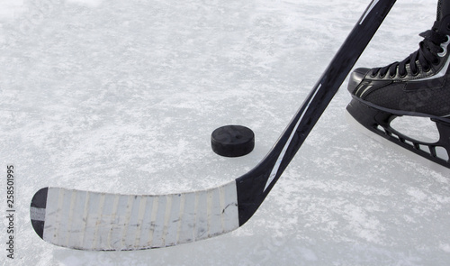 hockey stick puck and skate