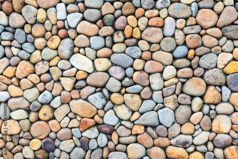 Colorful pebble stone wall texture - obrazy, fototapety, plakaty 