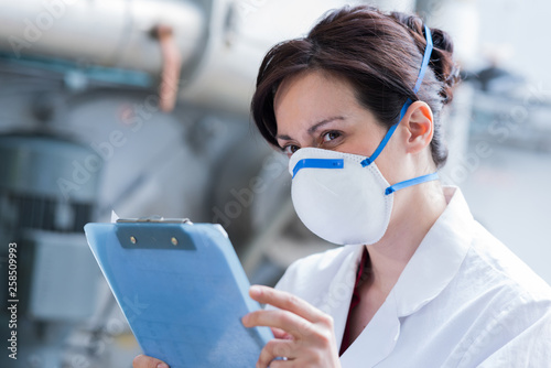 female worker at chemical industry