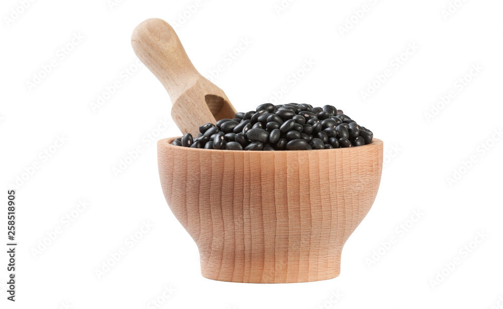 black bean in wooden bowl and scoop isolated on white background. nutrition. food ingredient. black bean in wooden bowl and scoop isolated on white background. nutrition. food ingredient.