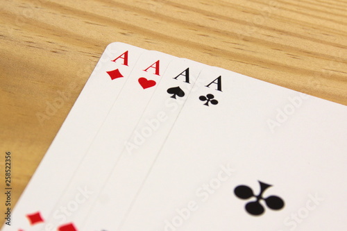 Four aces isolated on white