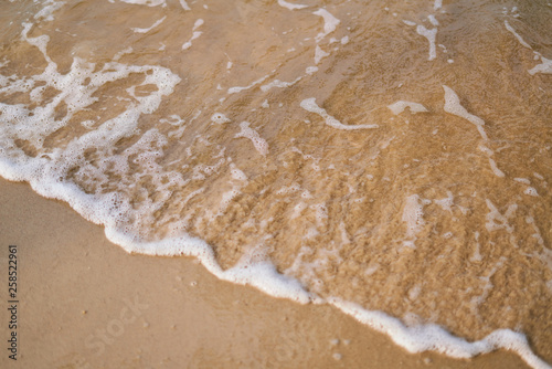 Sandy shore, tide close-up