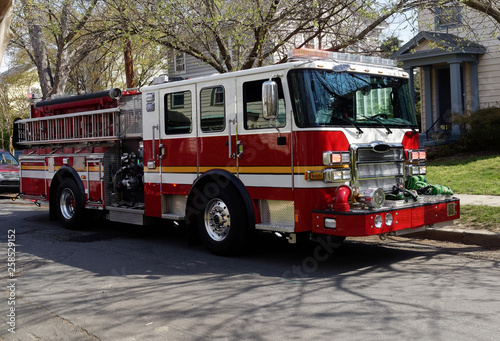 Slika na platnu Fire truck on the scene of neighborhood medical emergency.