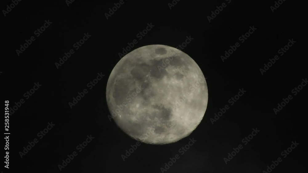 Moon with clouds passing by in the dark night sky, time lapse, cloudy, bright moon covered with clouds, highly detailed video Moon with clouds passing by in the dark night sky, time lapse, cloudy, bright moon covered with clouds, highly detailed video