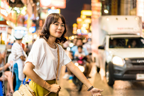 Young Asian Woman Traveler with view at China Town in Bangkok, Thailand