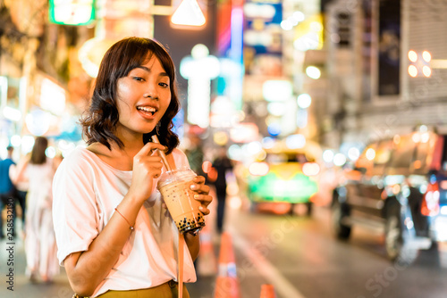 Young Asian Woman Traveler with view at China Town in Bangkok  Thailand