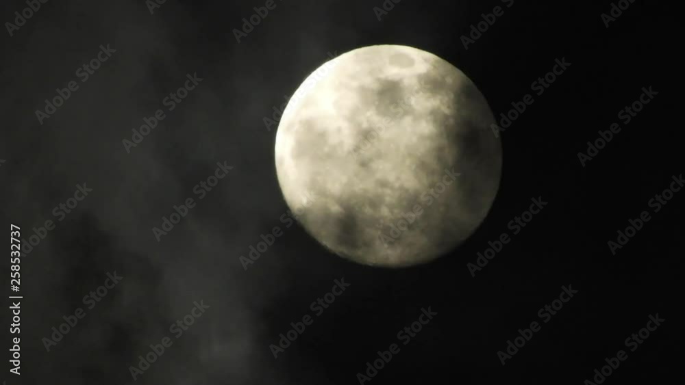 Moon with clouds passing by in the dark night sky, time lapse, cloudy, bright moon covered with clouds, highly detailed video Moon with clouds passing by in the dark night sky, time lapse, cloudy, bright moon covered with clouds, highly detailed video