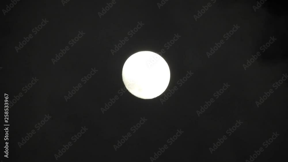 Moon with clouds passing by in the dark night sky, time lapse, cloudy, bright moon covered with clouds, highly detailed video Moon with clouds passing by in the dark night sky, time lapse, cloudy, bright moon covered with clouds, highly detailed video