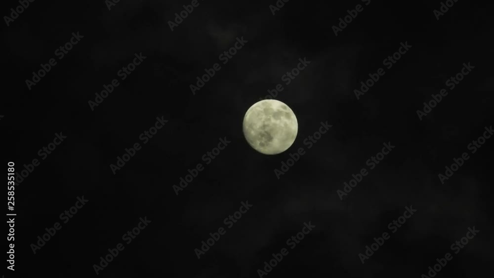 Moon with clouds passing by in the dark night sky, time lapse, cloudy, bright moon covered with clouds, highly detailed video Moon with clouds passing by in the dark night sky, time lapse, cloudy, bright moon covered with clouds, highly detailed video