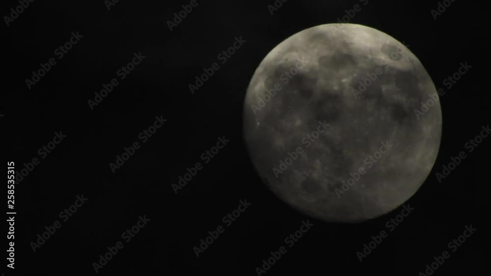 Moon with clouds passing by in the dark night sky, time lapse, cloudy, bright moon covered with clouds, highly detailed video Moon with clouds passing by in the dark night sky, time lapse, cloudy, bright moon covered with clouds, highly detailed video